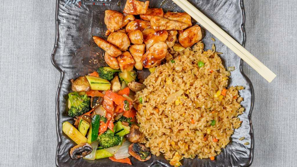 Hibachi Chicken · Gilled in our special hibachi sauce w. Fried rice or steamed rice and vegetable. Served w. clear soup and garden salad.