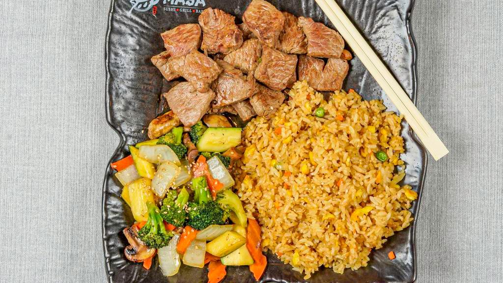 Hibachi Steak · (New York strip) gilled in our special hibachi sauce w. Fried rice or steamed rice and vegetable. Served w. Clear soup and garden salad.