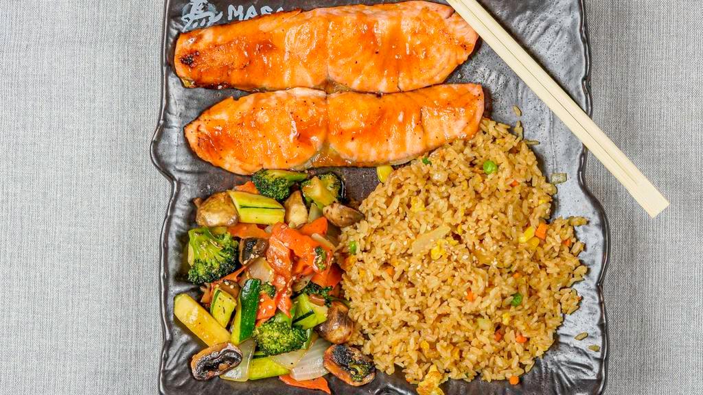 Hibachi King Salmon · Gilled in our special hibachi sauce w. fried rice or steamed rice and vegetable. Served w. clear soup and garden salad.