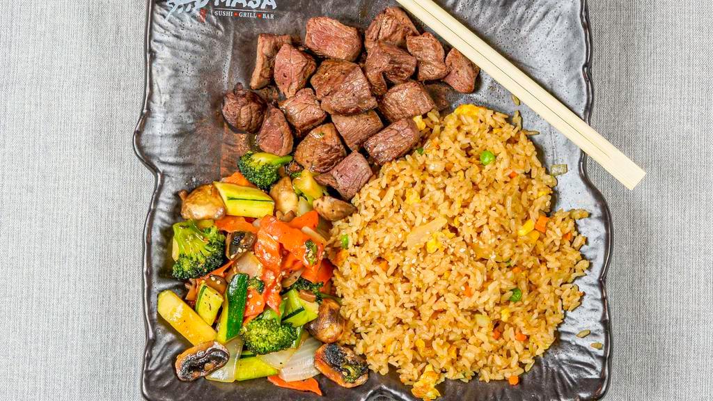 Hibachi Filet Mignon · Gilled in our special hibachi sauce w. fried rice or steamed rice and vegetable. Served w. clear soup and garden salad.