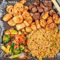 The Beast · Chicken, shrimp, scallop and filet mignon. Gilled in our special hibachi sauce w. fried rice...