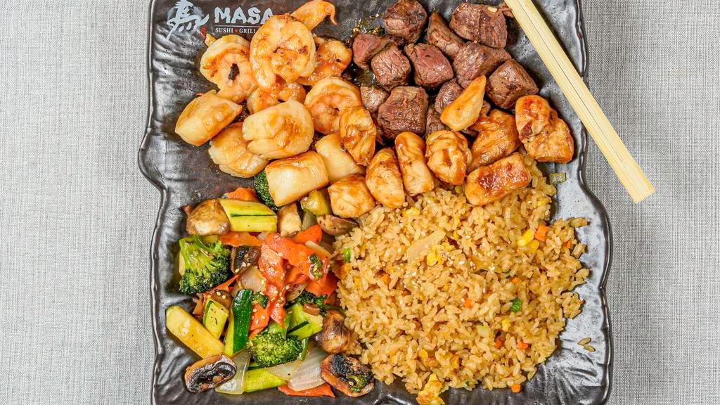 The Beast · Chicken, shrimp, scallop and filet mignon. Gilled in our special hibachi sauce w. fried rice or steamed rice and vegetable. Served w. clear soup and garden salad.