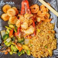 Blue Lava · Shrimp, scallop and lobster tail. Gilled in our special hibachi sauce w. fried rice or steam...