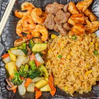 The Impossible · Chicken, steak and shrimp. Gilled in our special hibachi sauce w. fried rice or steamed rice...