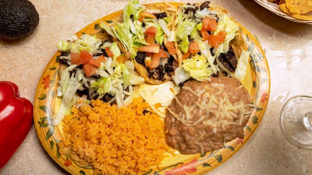 2 Taco Dinner · Choice of meat: Steak, chicken, beef, pastor, carnitas, Iengua, or vegetarian. Corn or flour tortilla.
Served with rice & beans only.