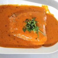 Salmon Tikka Masala · Fresh 8 Oz wild caught Atlantic Salmon fillet grilled simmered in a  rich tomato and cream s...