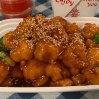 Sesame Chicken · Chicken breast lightly battered, crispy-fried and steamed broccoli coated with sweet sauce a...