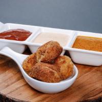 Croquetas (Croquettes) · Lightly breaded and fried fritters with your choice of filling.