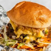 Taco Burger · Two patties, American cheese, Doritos™, and savory taco seasoning combined with fresh corn, ...