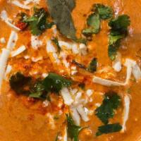 Shahi Paneer · Fresh cheese cooked in a lightly spiced garlic and herb tomato cream sauce.