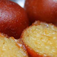 Gulab Jamun · Deep fried Cheese balls soked in honey syrup