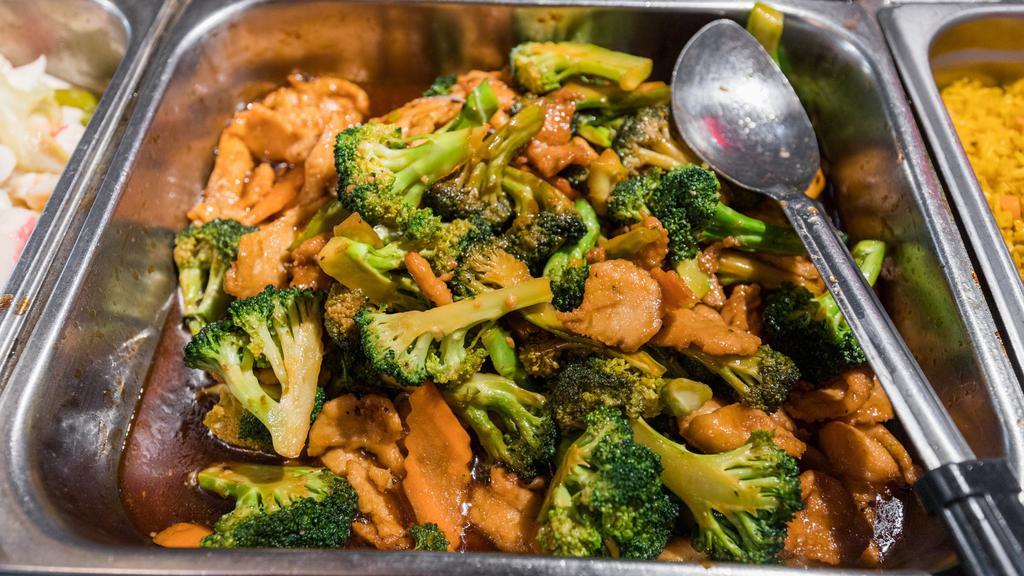 Broccoli Chicken · Stir-fried chicken with fresh crisp broccoli florets, carrots in our brown sauce.