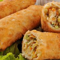 Egg Roll · Shredded pork and vegetables rolled tightly into a wonton wrap and fried to a golden brown.