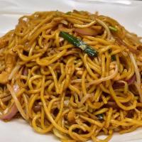 Chicken Lo Mein Noodles · Thick lo mein noodles stir fried and tossed with chicken napa cabbage carrots and onions.