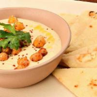 Hummus · Garbanzo beans - garlic - tahini - lemon juice - pita bread