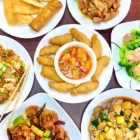 Family Value Meal Serves 4 · Your choice of any two different orders (quart size), four hong kong egg rolls or veggie rol...