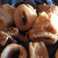 Calamari · Lightly breaded and fried. Served with cocktail sauce and lemons or a sauce to toss. Served ...