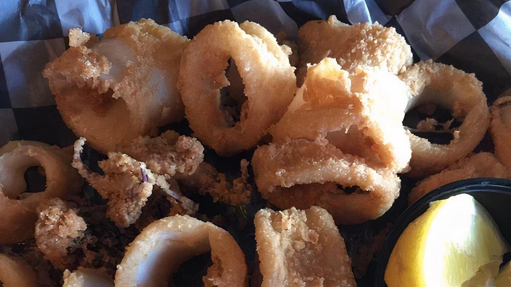Calamari · Lightly breaded and fried. Served with cocktail sauce and lemons or a sauce to toss. Served with choice of ranch or blue cheese dip.