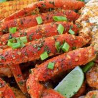 Snow Combo · Snow Crab Cluster with Cajun Shrimp, Sausage, Sweet Corn, Southern Potatoes, and Cajun Eggs
