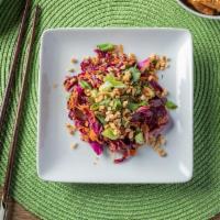 Saigon Veggie Slaw · Fresh and savory with a mild kick. Our slaw combines shredded purple cabbage, carrots, cilan...