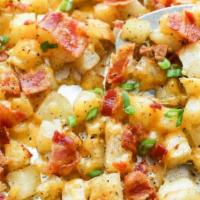 Red Skin Potatoes · With shredded cheese and bacon.