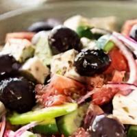 Original Greek Salad · Lettuce, tomatoes, onions, cucumbers, olives, beets, pepperoncini, and feta cheese with gree...