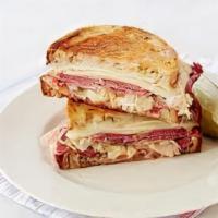 Reuben Sandwich · Thinly sliced corned beef or turkey with coleslaw or sauerkraut, swiss cheese, and thousand ...