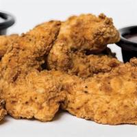 Chicken Tenders · Strips of tender chicken marinated in buttermilk, drenched in seasoned flour and deep fried ...