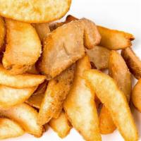 Basket Fries · Wedge cut, seasoned fries.  Enough to Share!