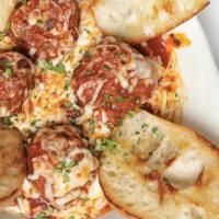 Oven-Baked Meatballs · Four of Buddy's homestyle meatballs smothered with your choice of sauce and oven-baked with ...