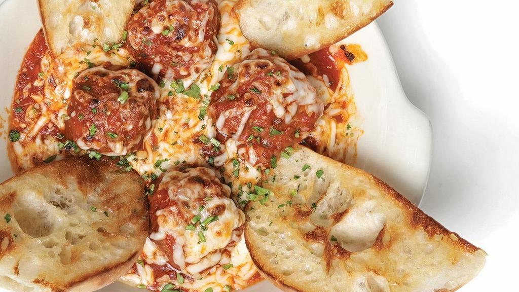 Oven Baked Meatballs · Four of Buddy's homestyle meatballs smothered with your choice of sauce and oven-baked with mozzarella cheese.  Served with 4 pieces of Buddy Bread.