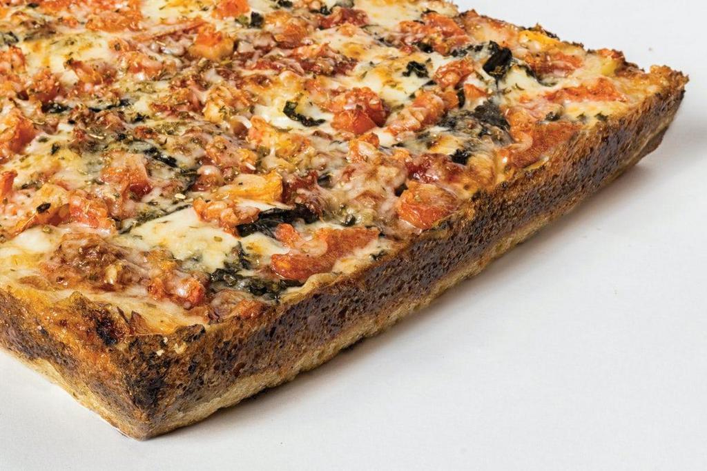 Margherita · Wisconsin brick cheese, diced tomatoes, garlic,. oregano, fresh basil, Asiago cheese and tomato. basil sauce.