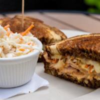 Reuben · Corned beef, sauerkraut, swiss & Thousand Island dressing on grilled rye bread.  Recommended...