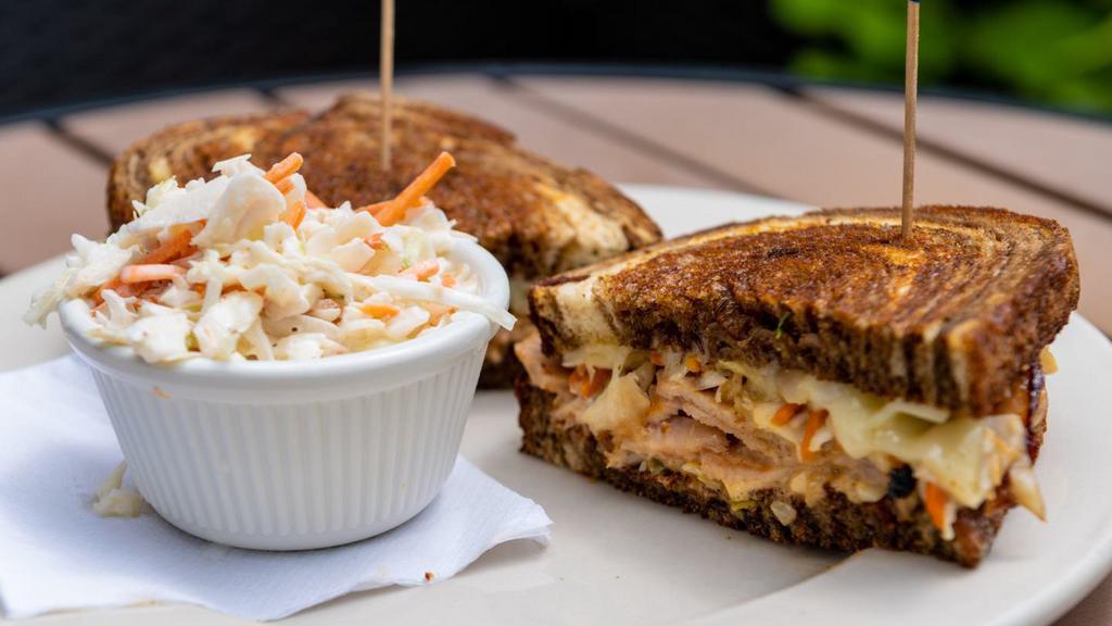Reuben · Corned beef, sauerkraut, swiss & Thousand Island dressing on grilled rye bread.  Recommended by Eileen.