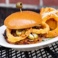 Southern Bbq Pork Sandwich · Slow cooked shredded pork roast, house made BBQ sauce & fried red onions on a grilled brioch...