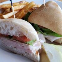 The Earl'S Club · Turkey, rasher bacon, Swiss cheese, lettuce, and tomato served on ciabatta bread. Served hot...