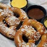 Soft Pretzels (Vegetarian) · 3 Big Soft Pretzels served with spicy mustard, nacho cheese and our house made cinnamon cara...