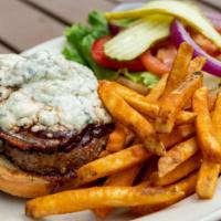 Smoking Black & Bleu Burger · A ½ pound Angus Beef patty brushed w/ chipotle Tabasco & topped w/ gorgonzola & rasher bacon.