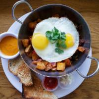 Choripapa · two sunny up eggs, chorizo, red onions, poblano peppers, cherry tomatoes, herbed home fries,...