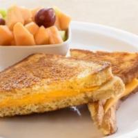Grilled Cheese · Texas toast with Colby-Jack cheese. Includes seasonal fruit cup.