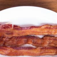 Maple Roasted Bacon · three slices of thick cut bacon caramelized with Michigan maple syrup