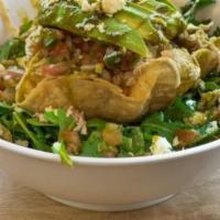 Taco Salad · mixed greens, corn tortilla strips, black beans, pulled chicken, pico de gallo, avocado, que...