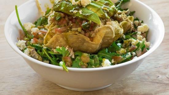 Taco Salad · mixed greens, corn tortilla strips, black beans, pulled chicken, pico de gallo, avocado, queso fresco, herb vinaigrette