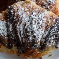 Chocolate Hazelnut Croissant · Our twice baked butter croissant filled with our very own all natural nutella - a blend of h...
