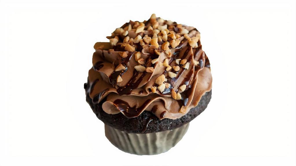 Chocolate Peanut Butter Cupcake · Chocolate cake, peanut butter filling, peanut butter buttercream, chocolate ganache, granulated peanut sprinkle.
All bakery items are individually wrapped.
Limited quantities available based on demand.
If item is not available at time of order you can exchange for any other bakery item of similar value.
No refunds on bakery items due to limited availability.