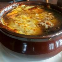 French Onion · Caramelized onions in a rich beef broth topped with croutons and baked Provolone cheese. Ple...