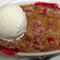 Cherry Cobbler · Warm cherry cobbler  served with Hudsonville ice cream.