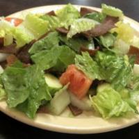 Fattoush · Traditional salad mixed with pita chips.