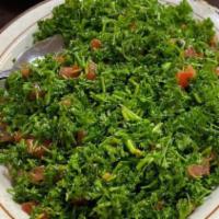 Tabbouli · Chopped parsley, tomatoes, chives & cracked wheat mixed in lemon dressing.