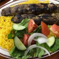 Shish Kafta * · Quality beef ground with parsley, & onions seasoning, and charbroiled. Comes with two sides.